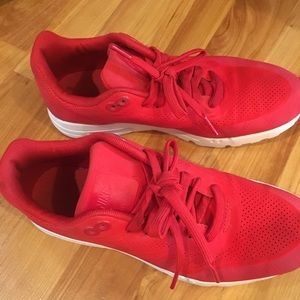 Bright red Nike sneakers.
